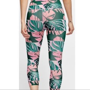 Nike High rise tight fit crop length leggings in size Medium